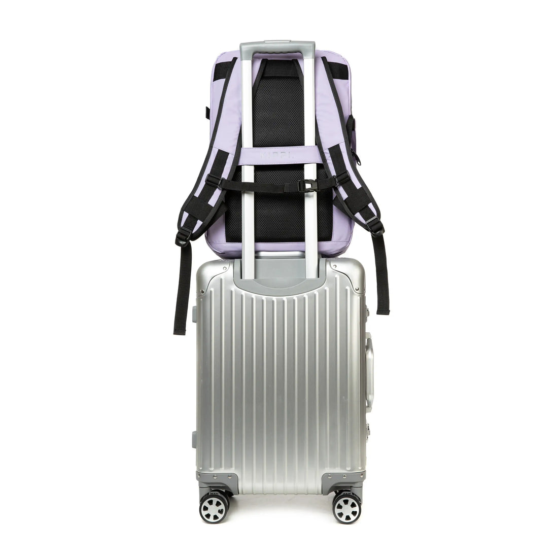 Mochila de viaje purple con maleta